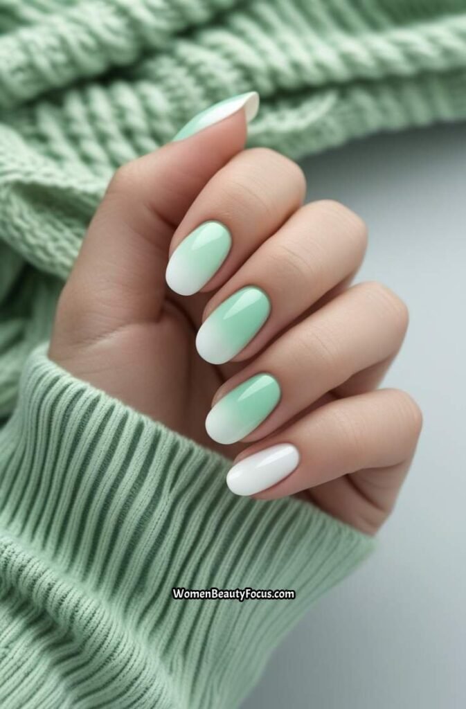 8. Mint Green and White Ombre Nails