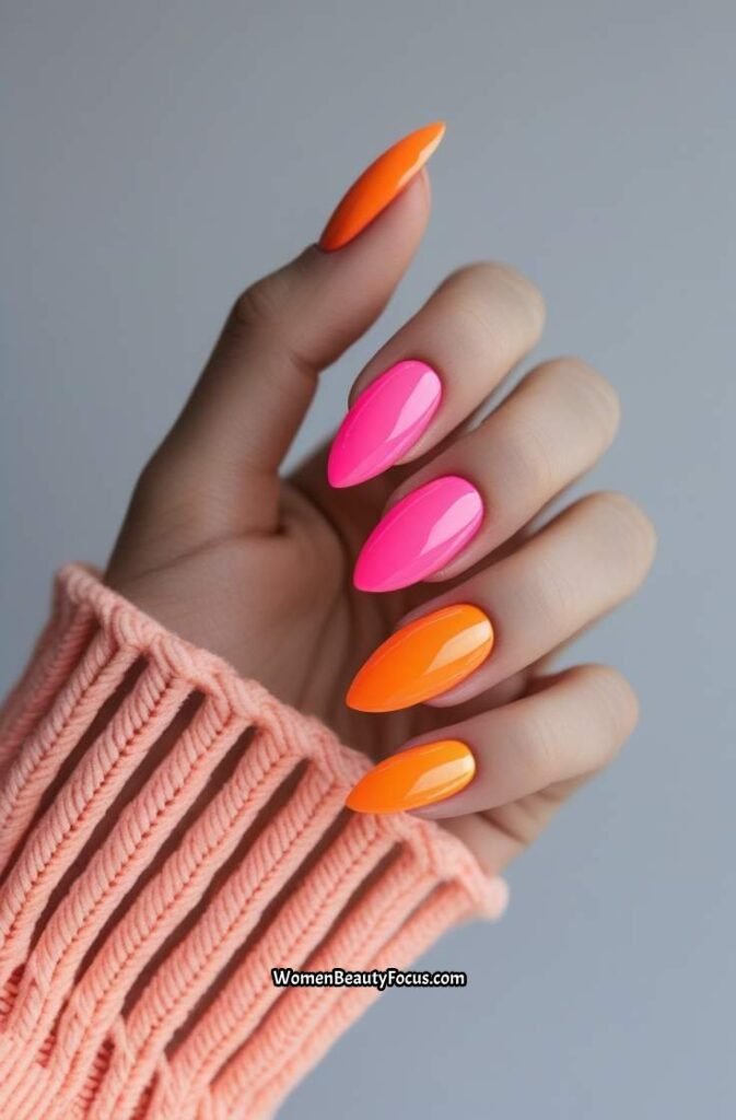 8. Neon Pink and Orange Half Moon Nails