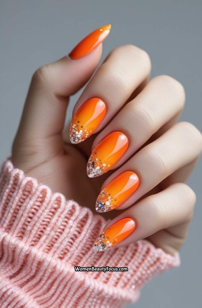 8. Orange Gradient with Glitter Tips