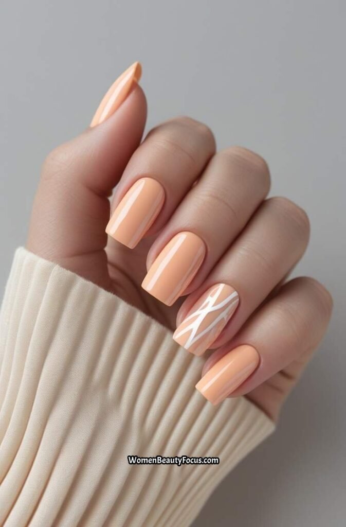 8. Peachy Square Nails with White Abstract Lines