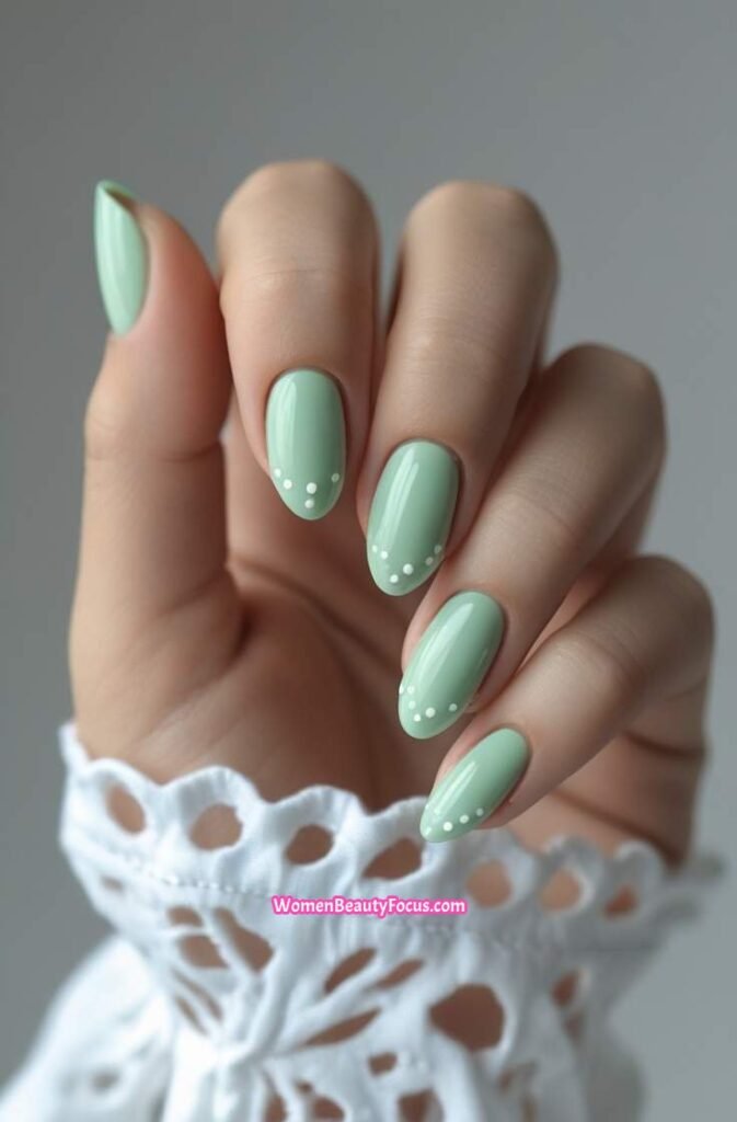 8. Soft Mint Green Nails with Minimal Dots