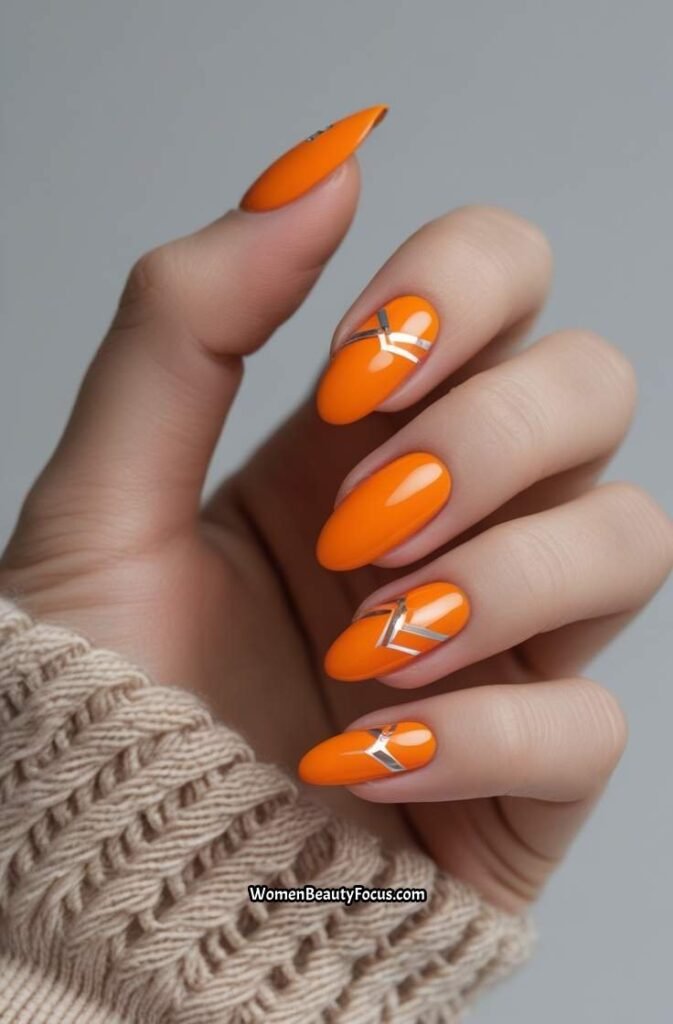 9. Bright Orange with Geometric Silver Designs