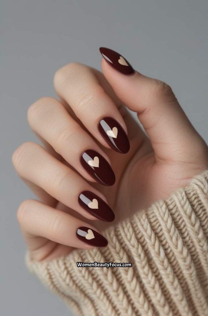 9. Cherry Brown Nails with Subtle Hearts