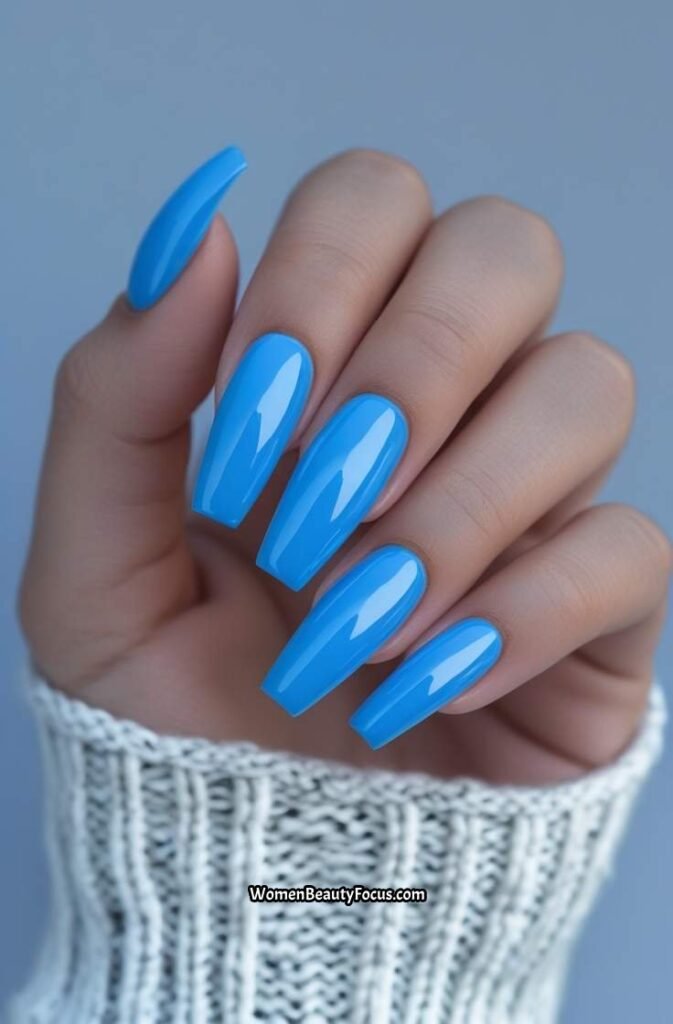 9. Neon Blue Coffin Nails with Gloss Finish