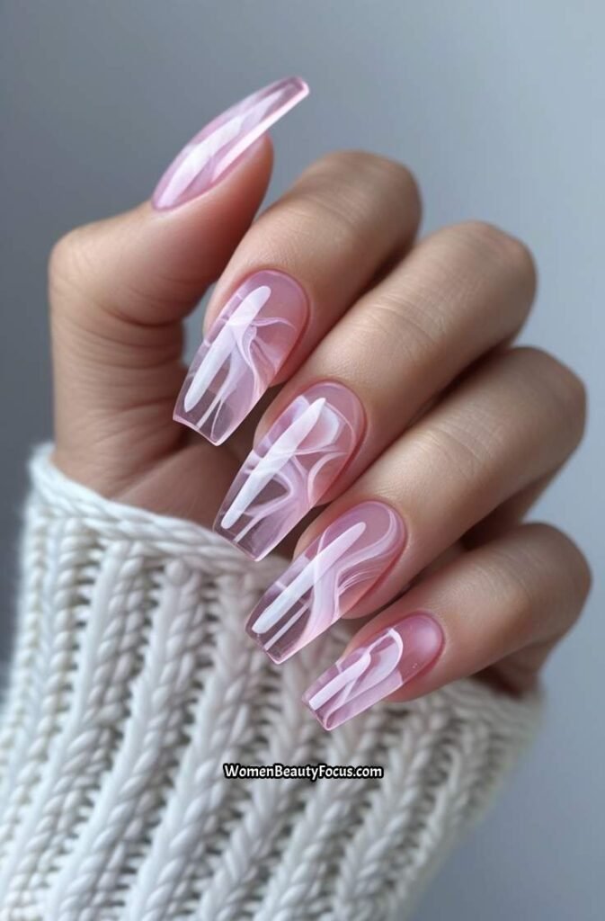 9. Rose Quartz Gel Nails with Marbled Detail
