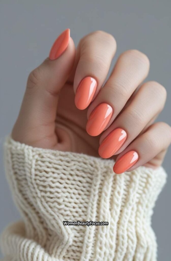 9. Soft Coral Short Nails