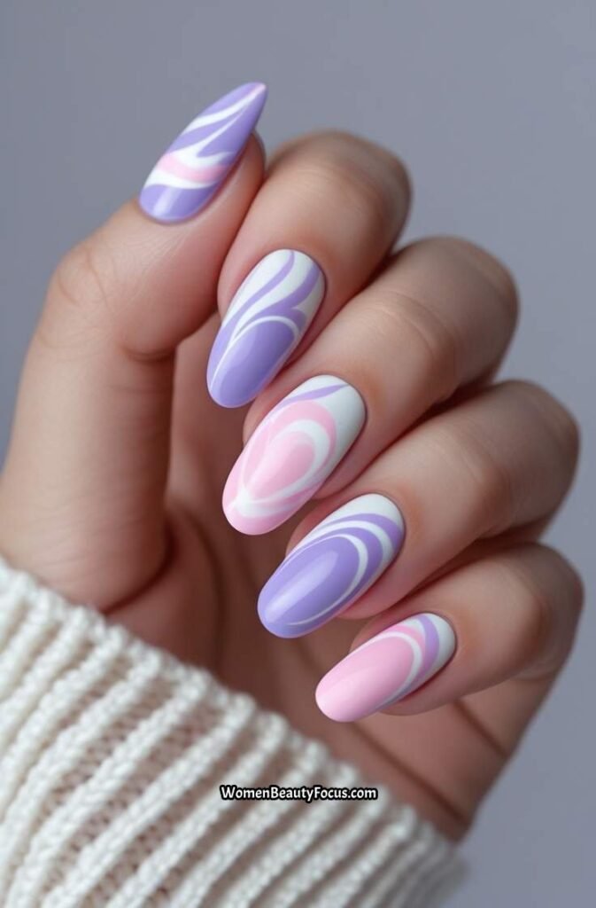 9. Soft Purple and Pink Swirl Nails