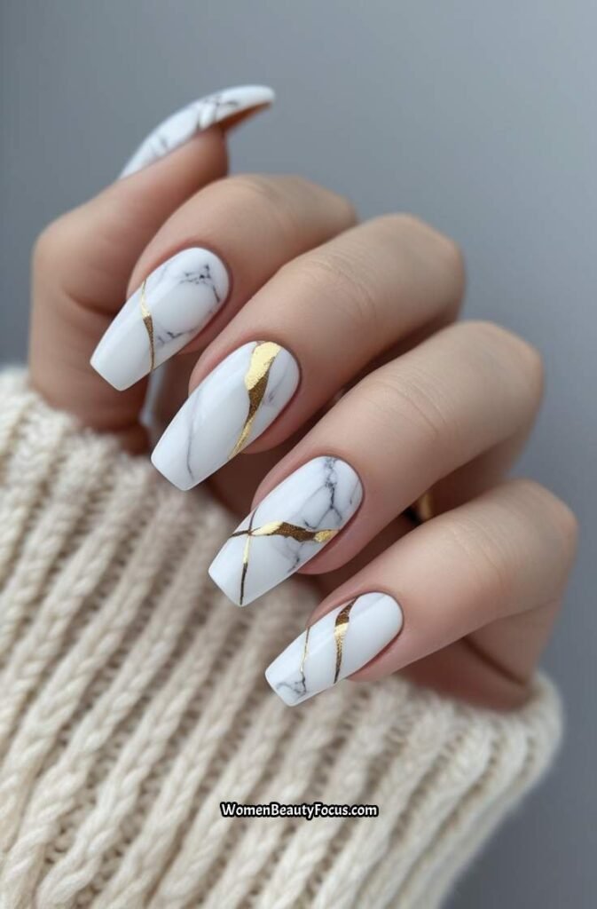 9. White Marble Nails with Gold Veins