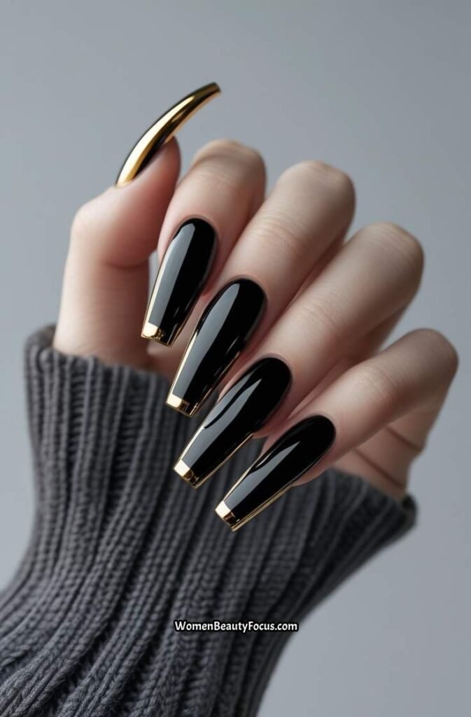 1. Black Coffin Nails with Gold Chrome Tips