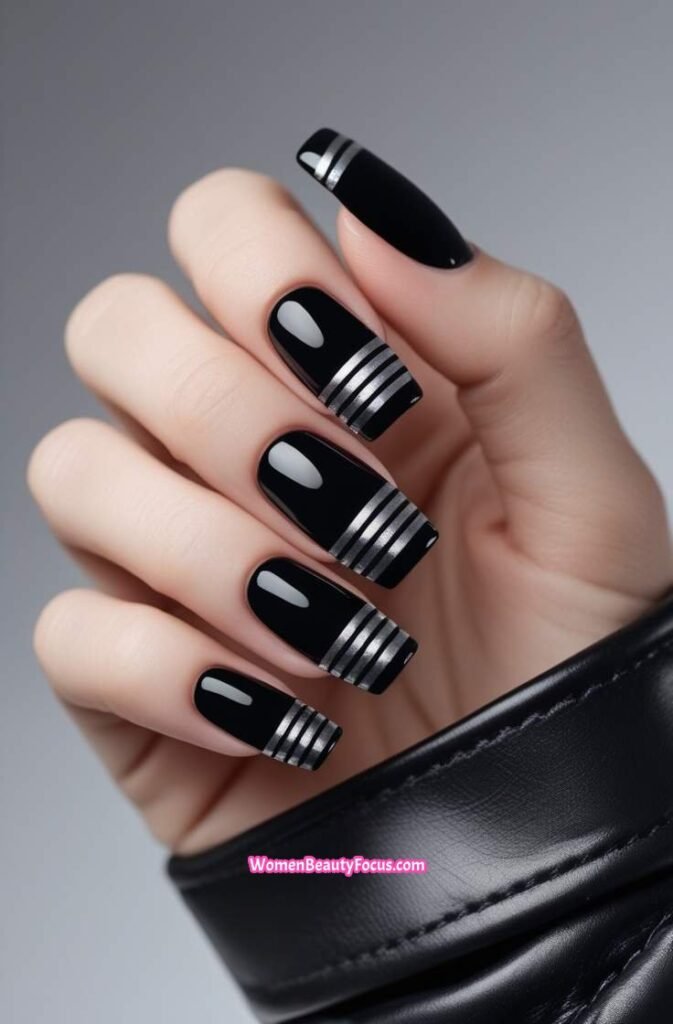 1. Bold Black Square Nails with Silver Stripes