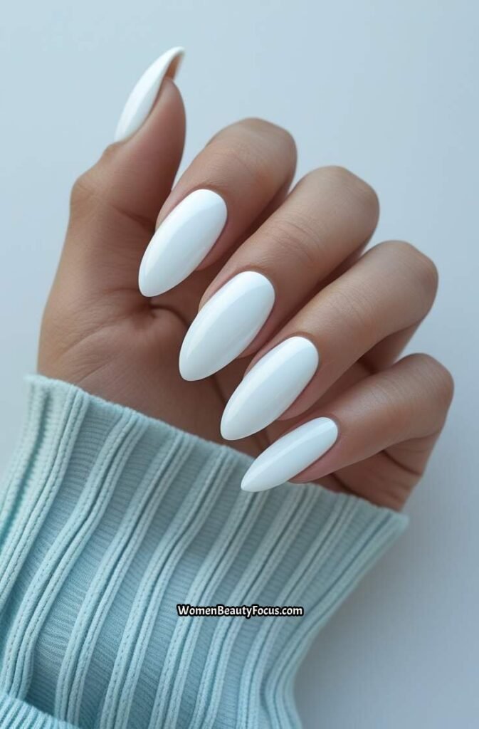 1. Classic Glossy White Almond Nails