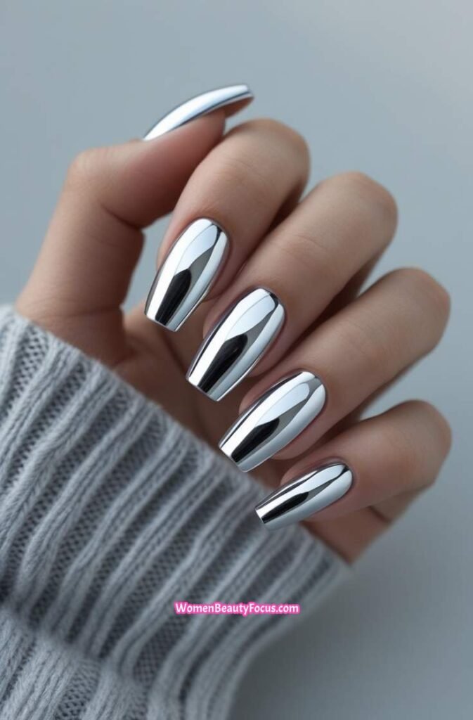 1. Shiny Silver Chrome Nails with a Glossy Finish