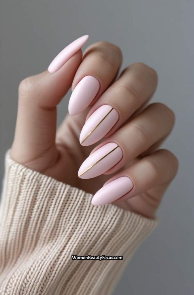 1. Soft Pink Almond Nails with Minimal Gold Lines