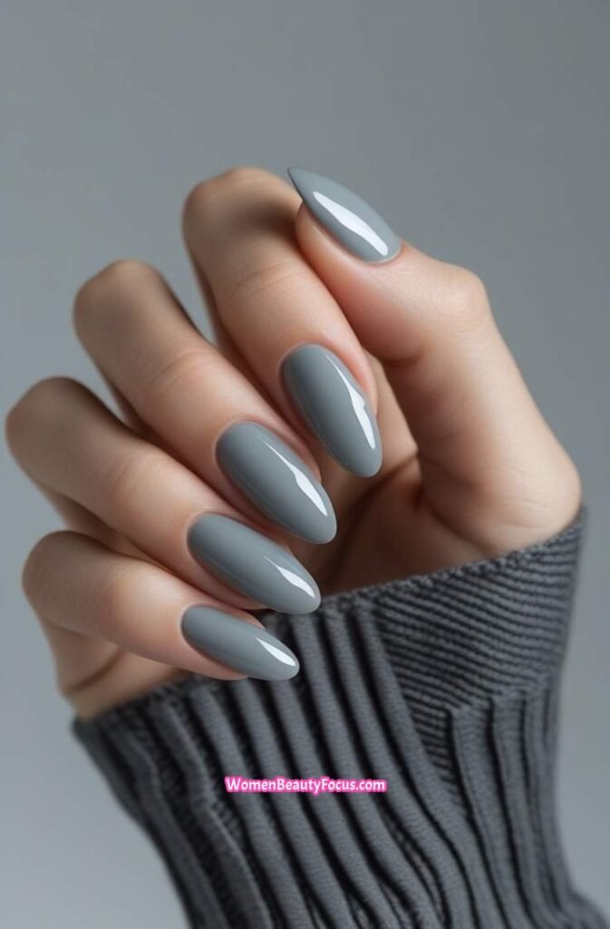 10. Light Grey Glossy Nails with Oval Shape