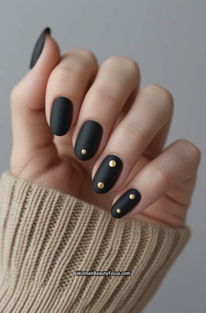10. Minimalist Black Nails with Gold Dots