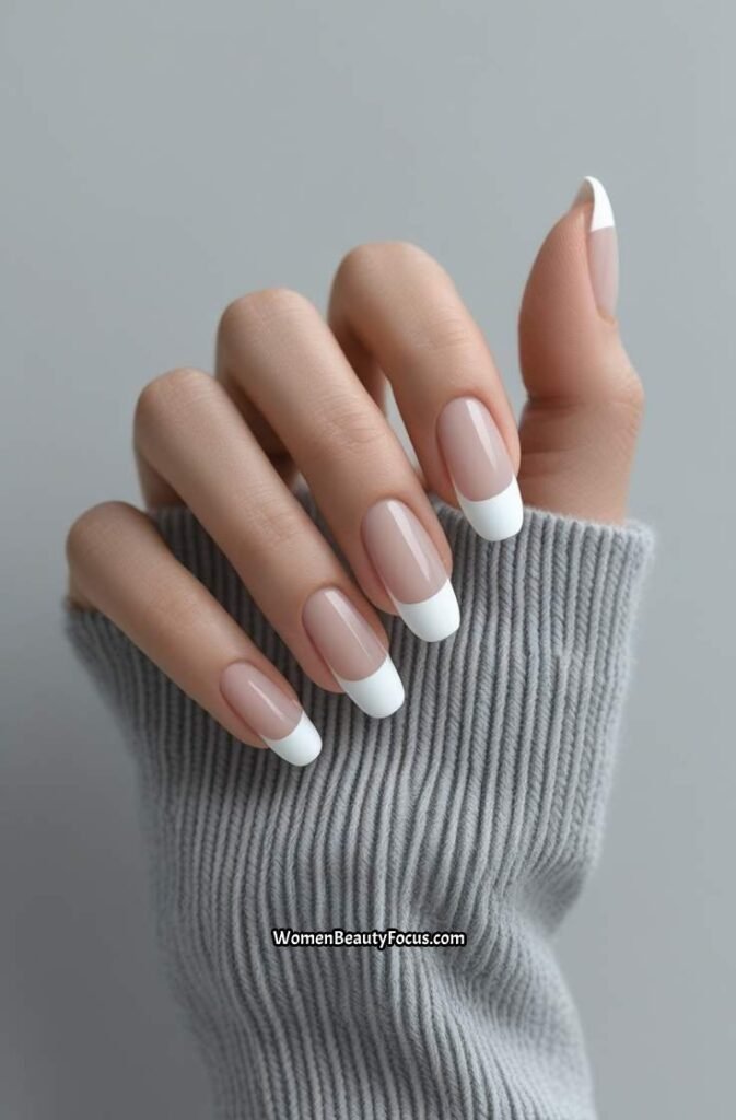 10. Minimalist French Tips with Negative Space
