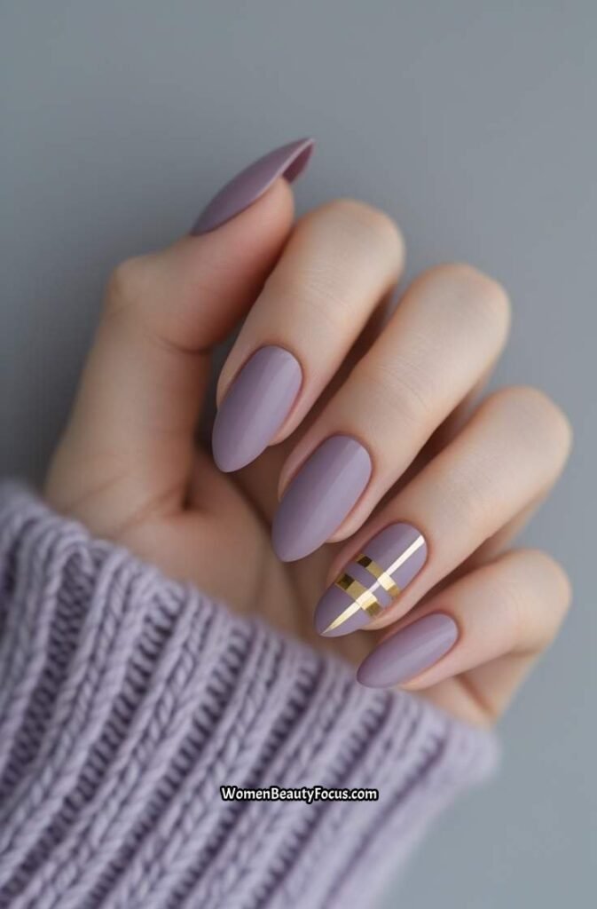 10. Pale Mauve Nails with Gold Striping Tape