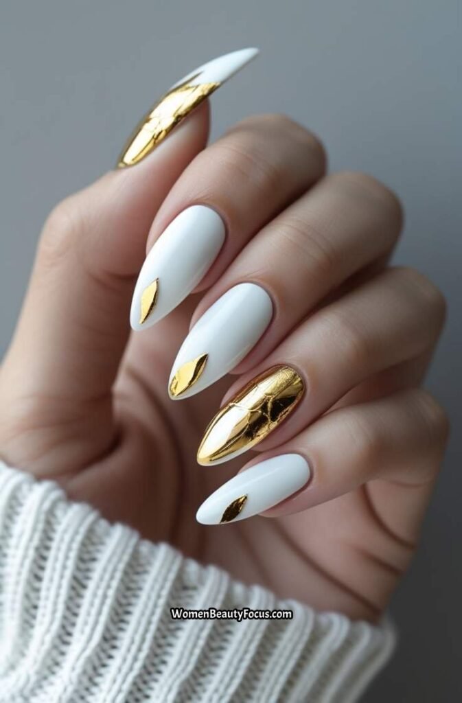 10. White Nails with Gold Leaf Design