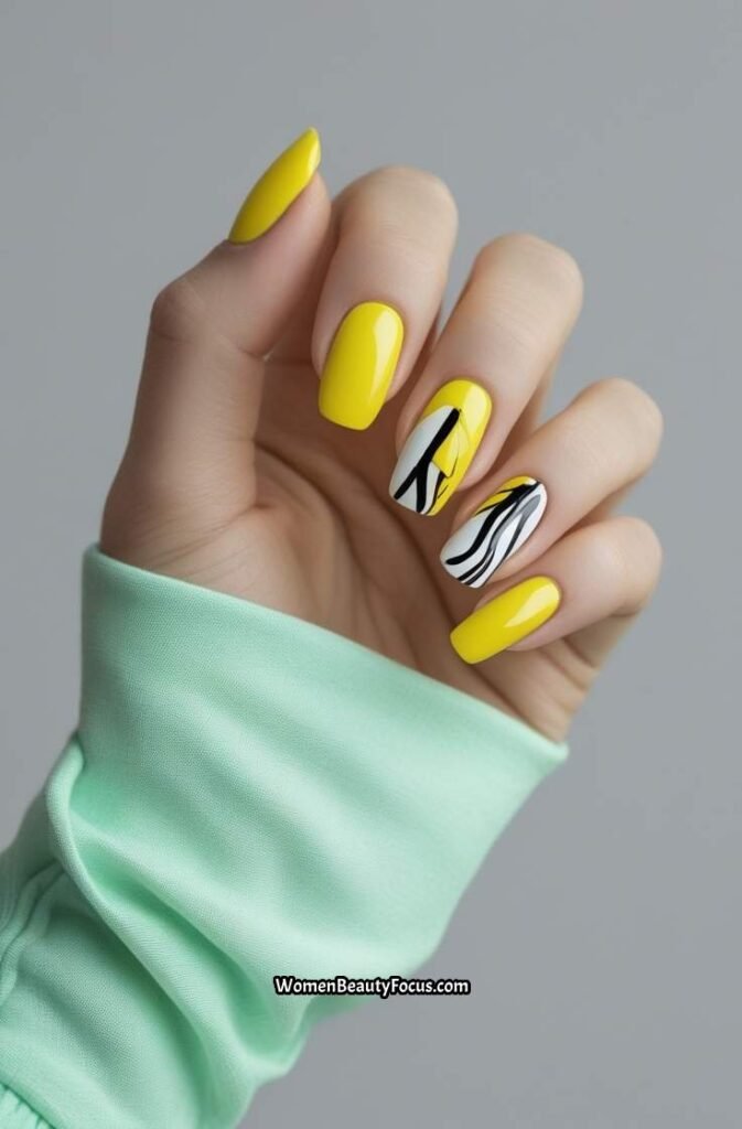 11. Bright Yellow Nails with Abstract Art