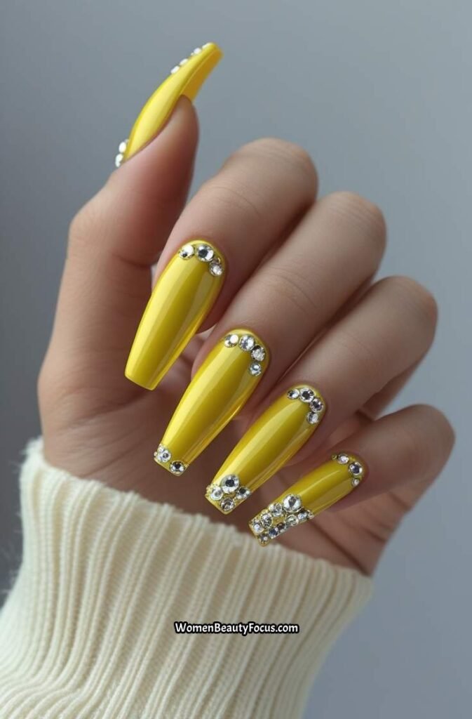 11. Chrome Yellow Coffin Nails with Rhinestone Detail