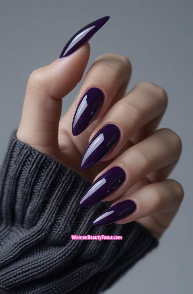 11. Dark Purple Nails with Glossy Finish