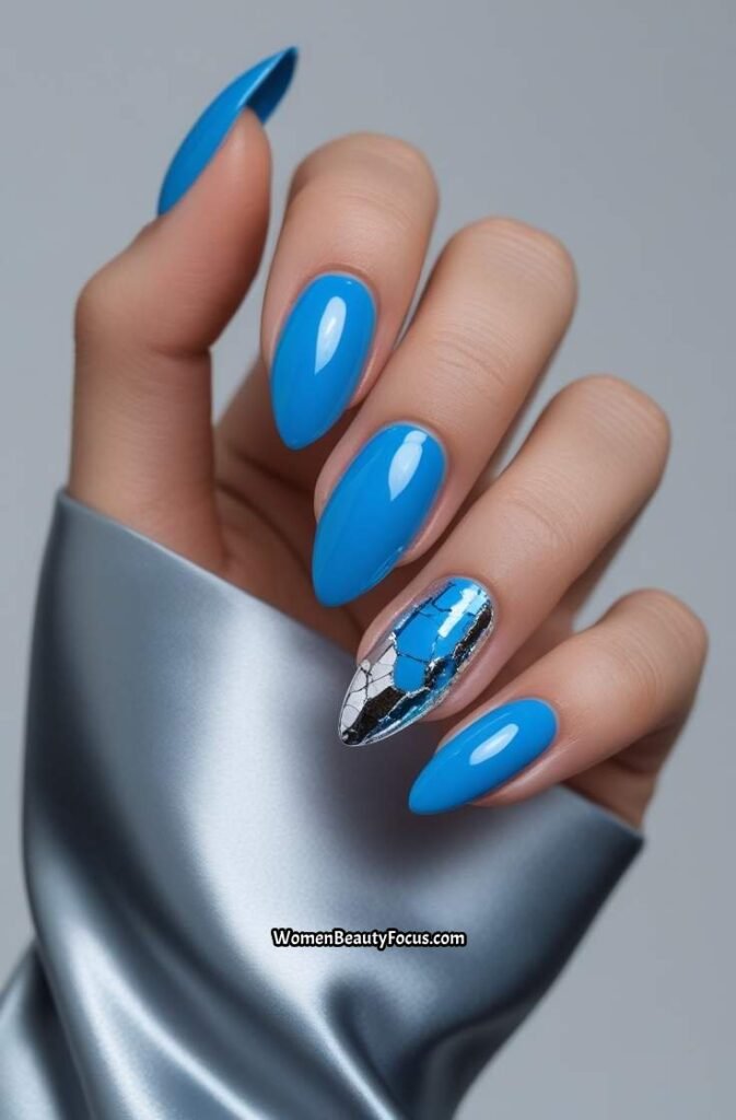 11. Electric Blue Nails with Silver Foil