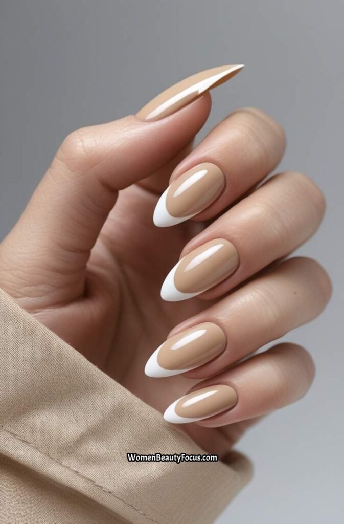 11. Glossy Beige Almond Nails with Micro French Tips