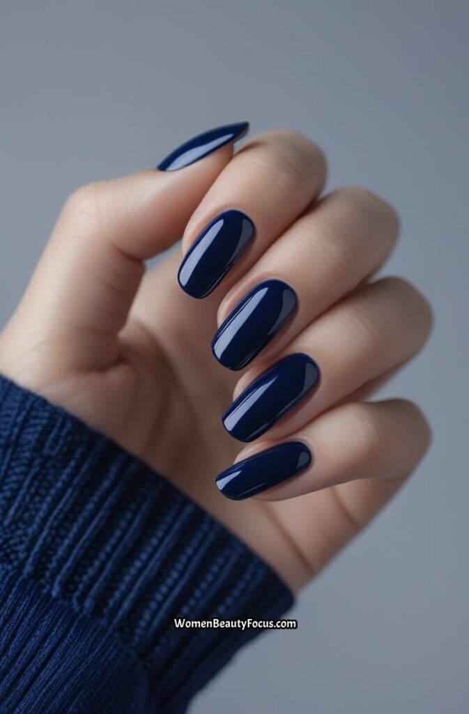 11. Glossy Midnight Blue Nails