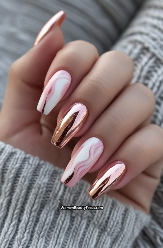 11. Rose Gold Foil Marble Nails