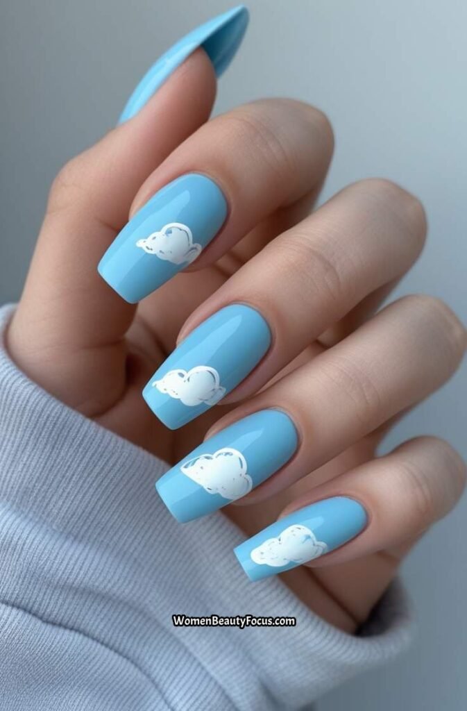 11. Sky Blue Coffin Nails with Cloud Art