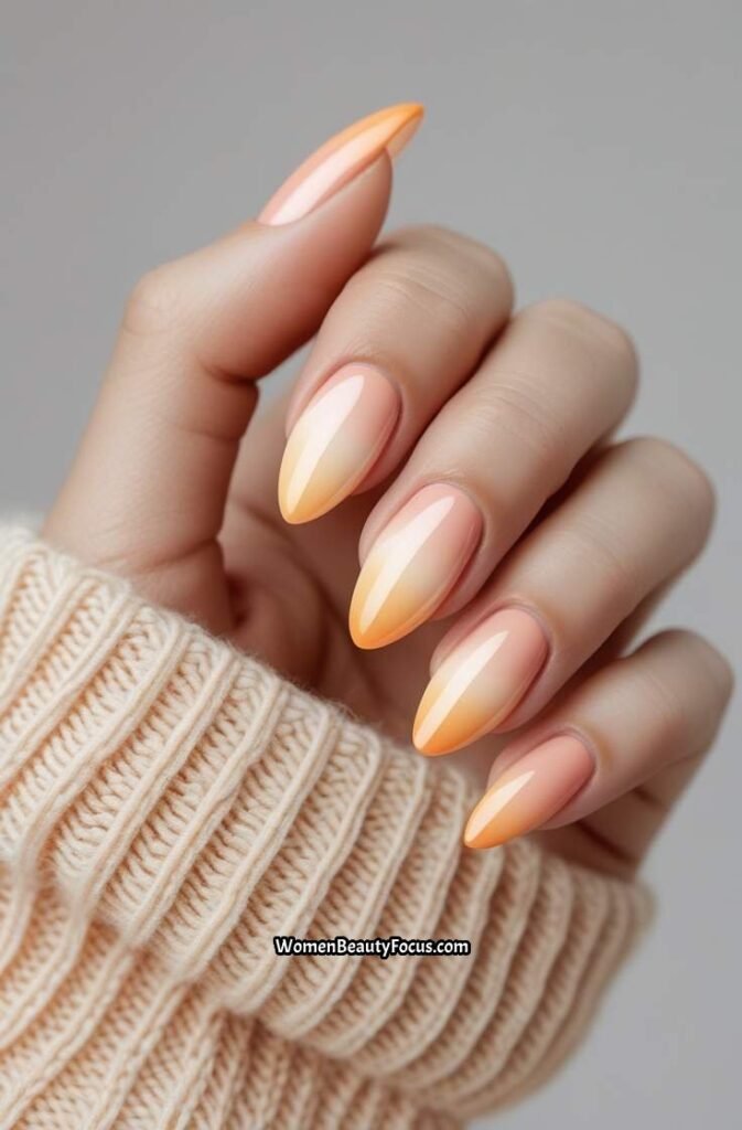 11. Soft Peach Ombre Nails with Gloss Finish