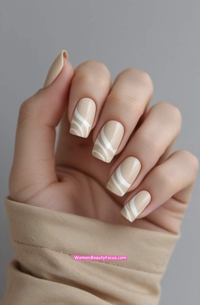 12. Beige Swirl Nails with Neutral Base