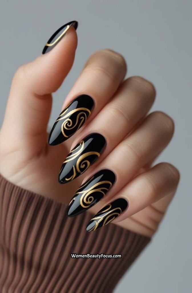 12. Black and Gold Swirl Nails
