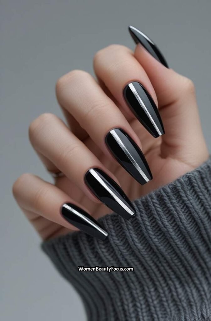 12. Metallic Black Cat Eye Nails