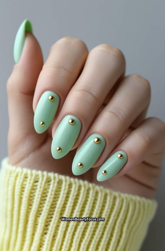 12. Mint Almond Nails with Gold Studs