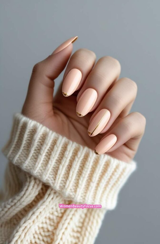 12. Simple Peach Nails with Gold Tips