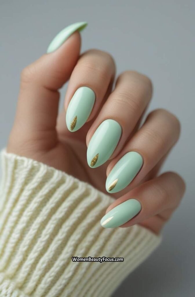 12. Soft Mint Green Nails with Gold Details