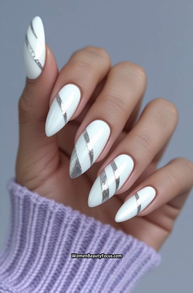 12. White Almond Nails with Silver Stripes