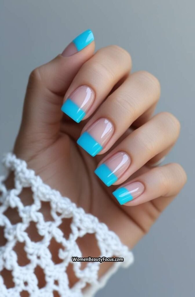 13. Aqua Blue French Tips on Sheer Nails
