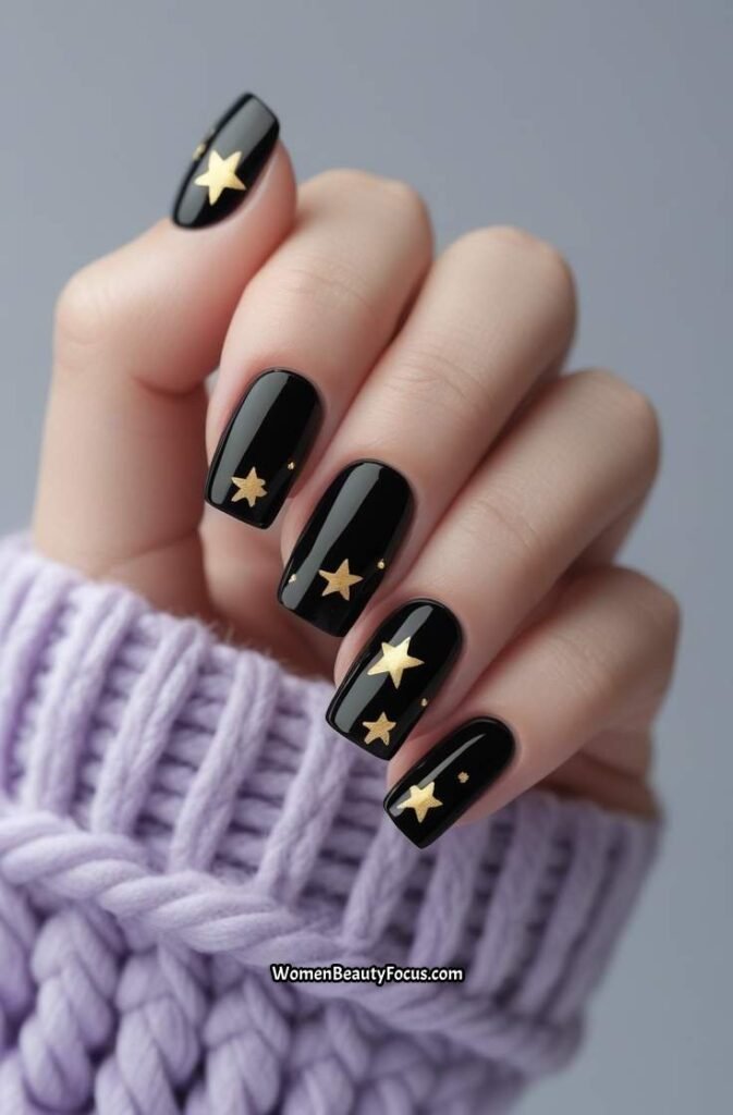 13. Black Nails with Gold Stars
