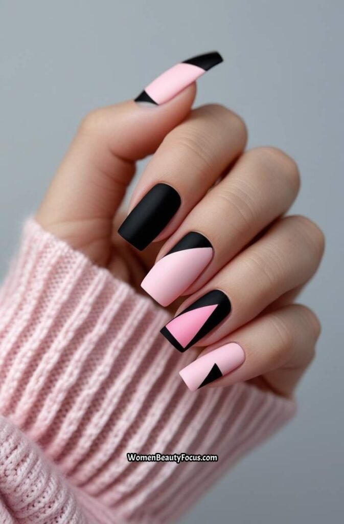 13. Black and Pink Negative Space Nails