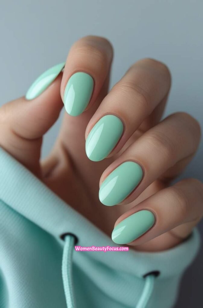 13. Glossy Seafoam Green Nails