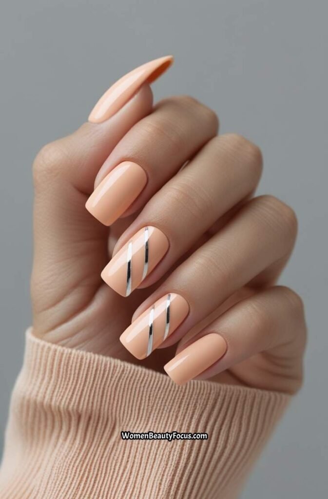 13. Light Peach Nails with Thin Silver Lines