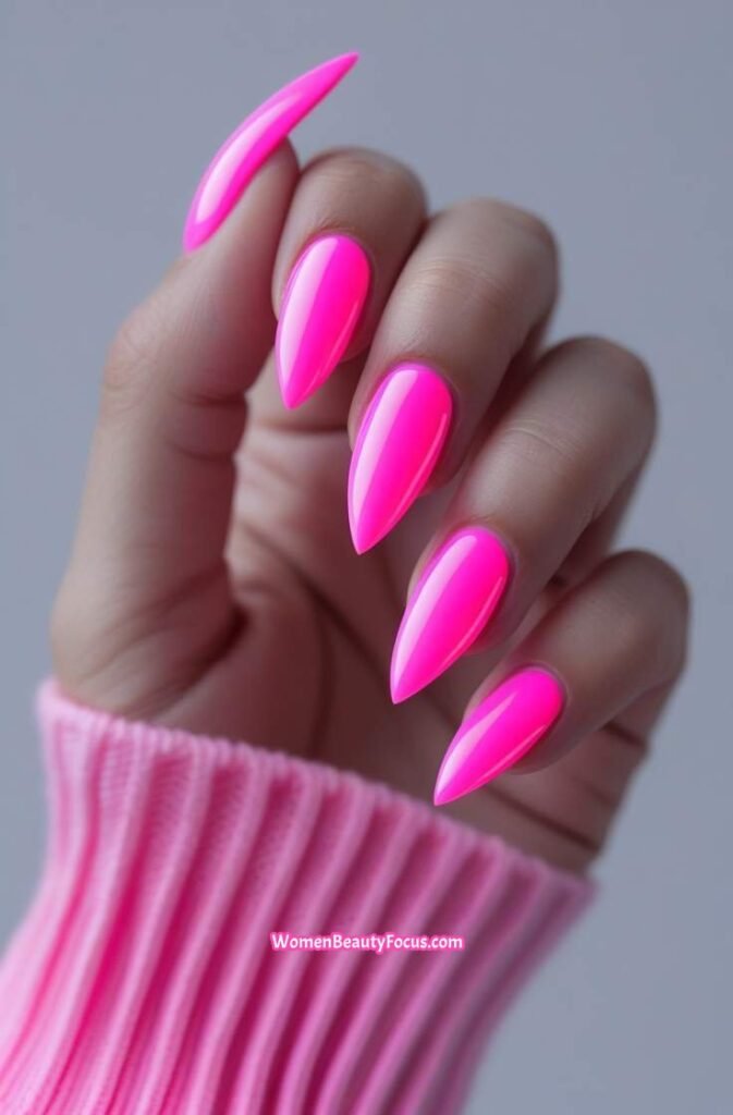 13. Neon Pink Cat Eye Nails