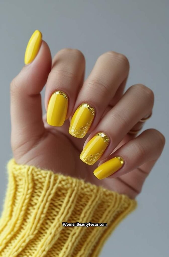 13. Sunflower Yellow Nails with Glitter Accents