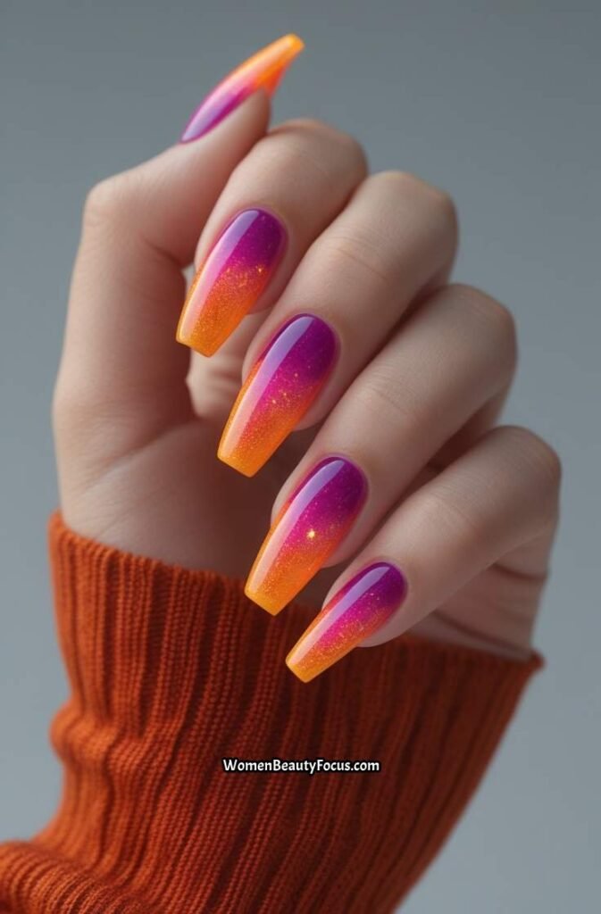 13. Sunset Aura Nails with Orange and Magenta
