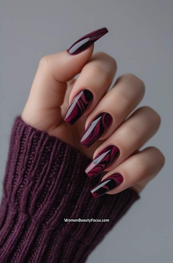 14. Deep Burgundy Red Marble Nails