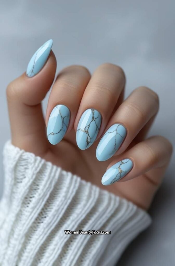 14. Pale Blue Marble Nails