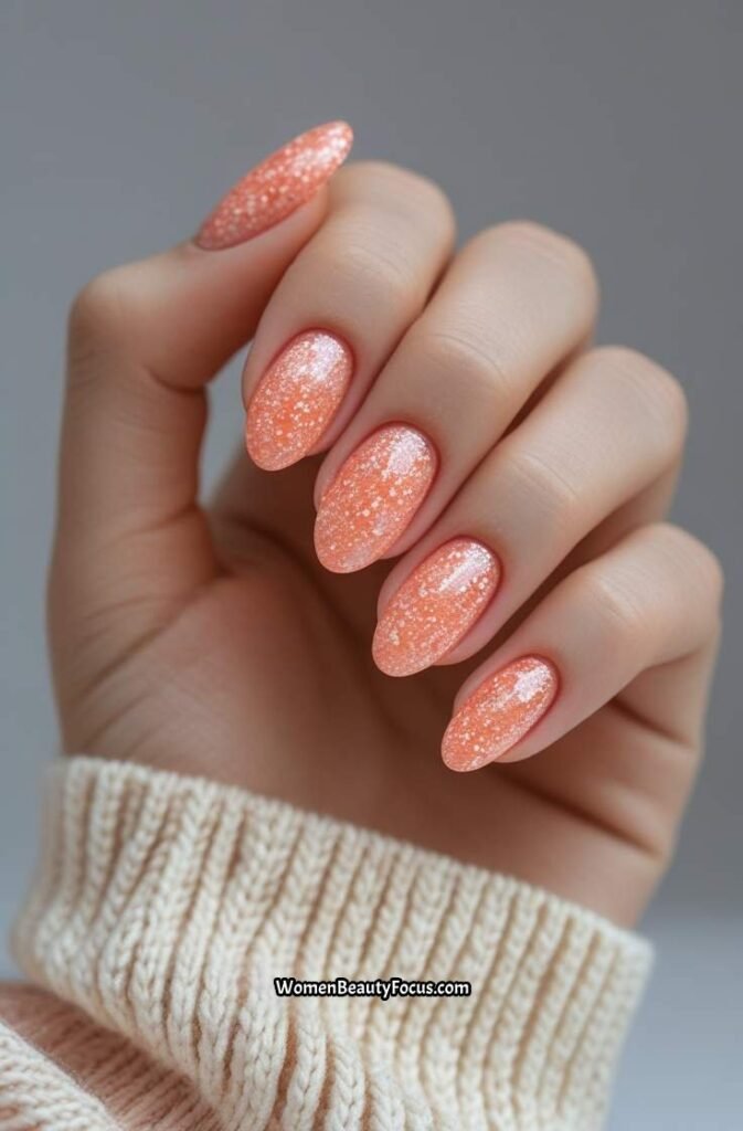 14. Peachy Coral Glitter Nails