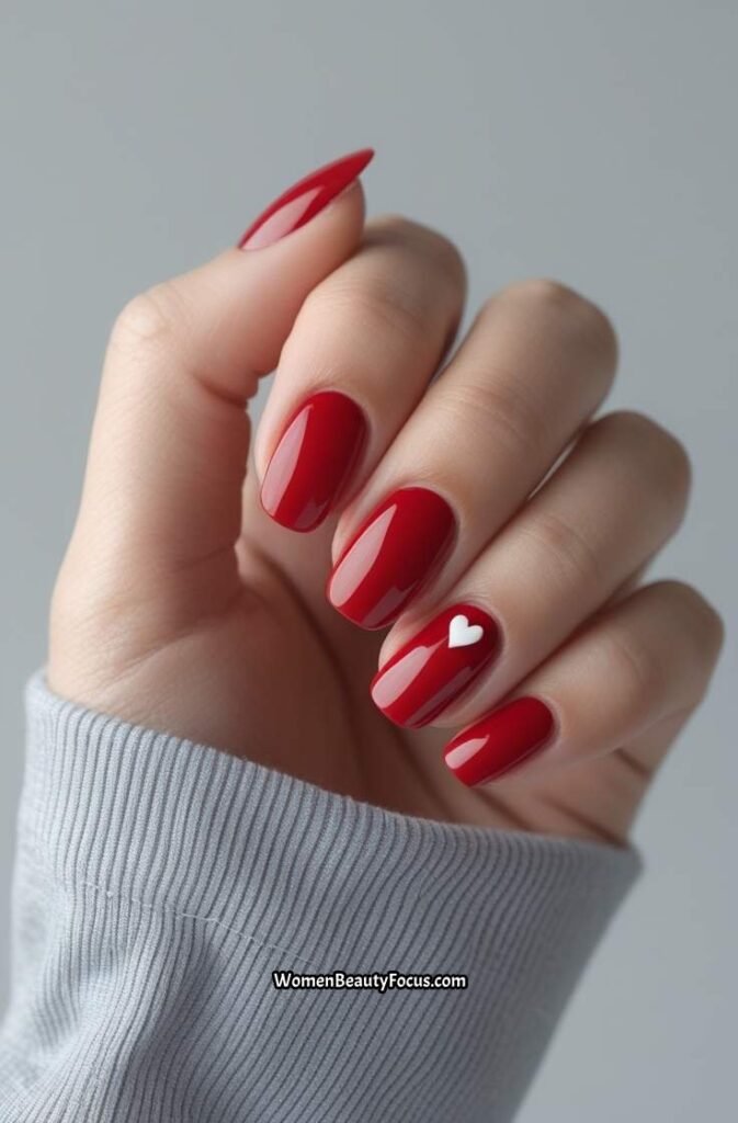 14. Short Glossy Red Nails with Heart Art